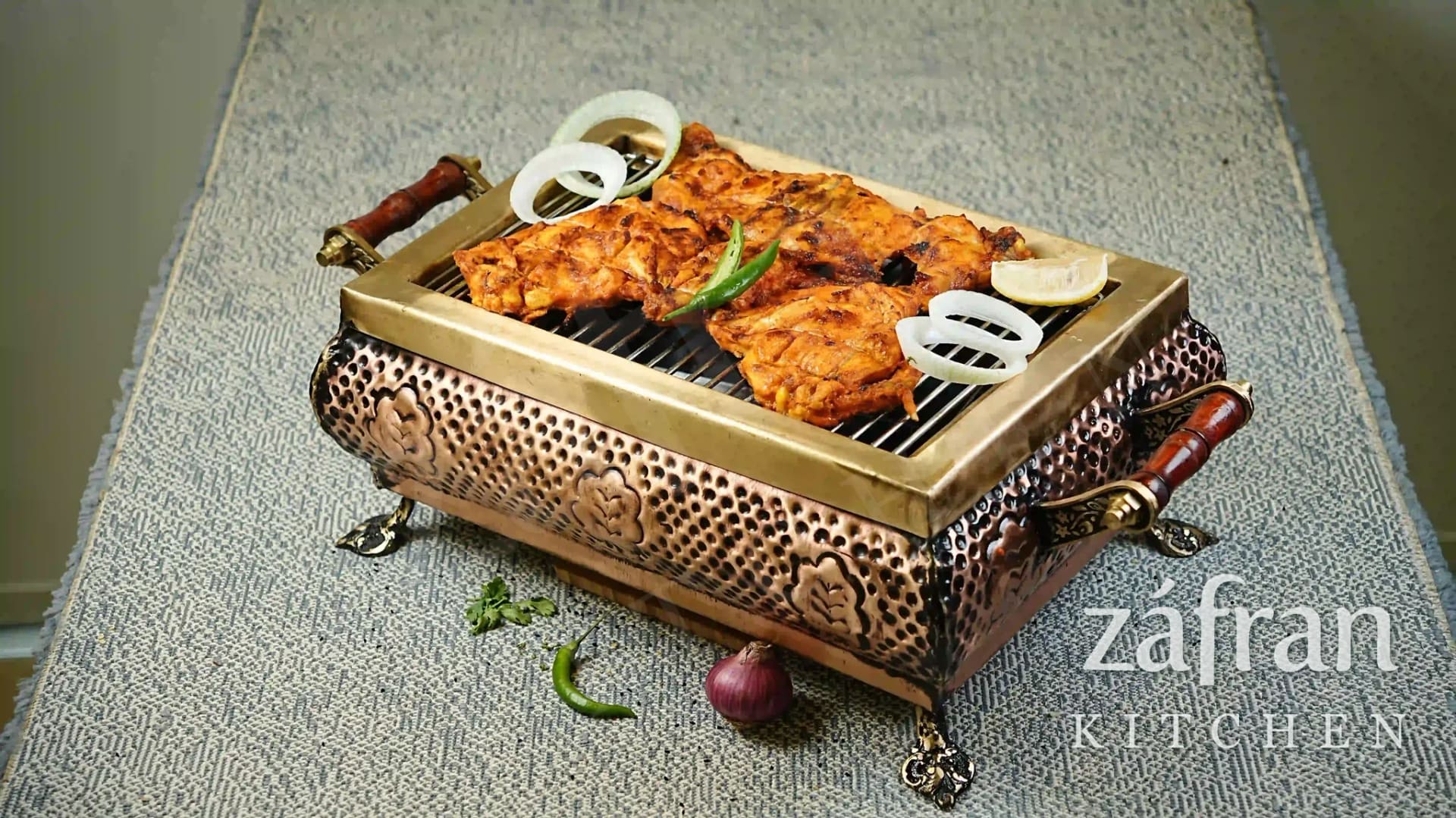 Whole chargha, a spiced steamed and fried chicken, at Zafran Kitchen Ajman