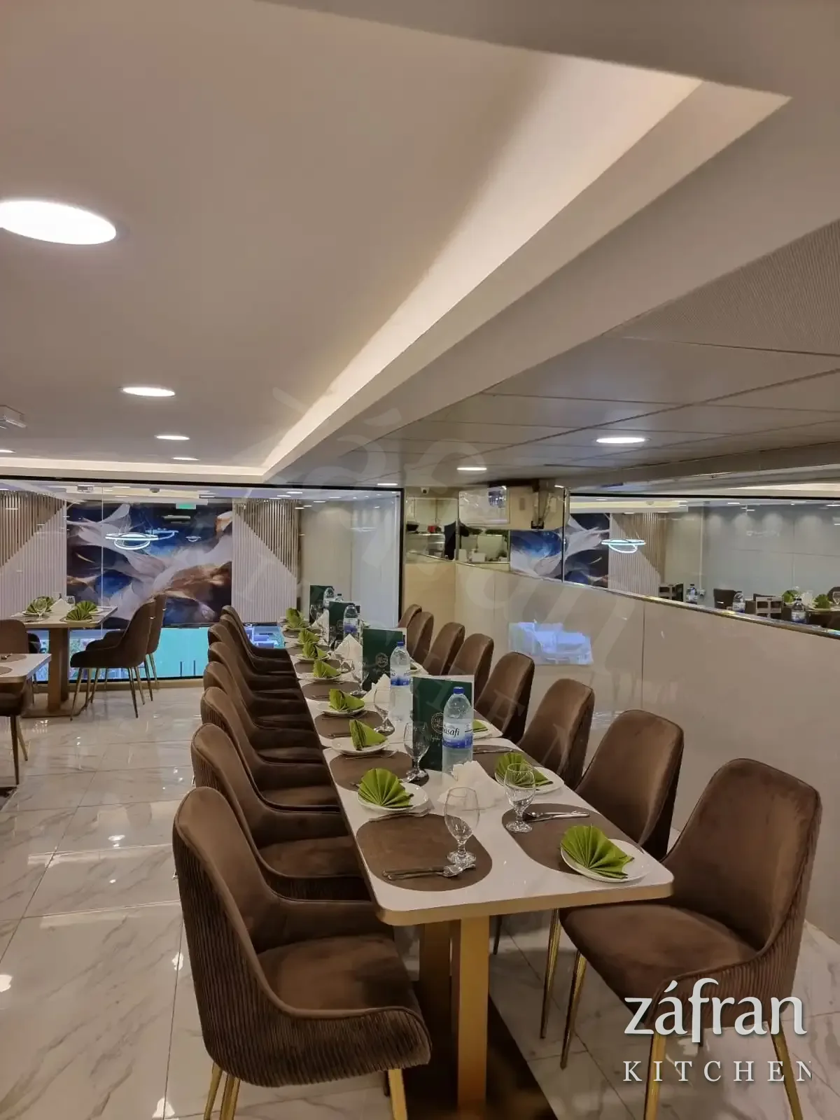 The dining room at Zafran Kitchen and Restaurant, Amman Street, Ajman Industrial Area 2, with a long table laid for a group